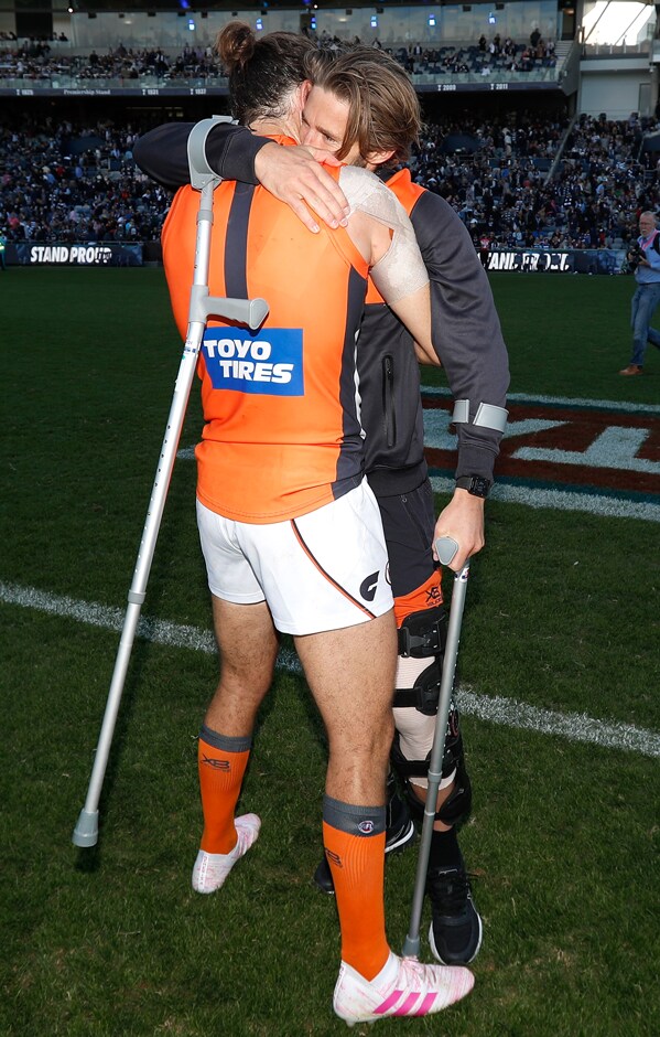 SLIDER-LEONR42019.png Co-captains Phil Davis and Callan Ward embrace following the GIANTS' win over Geelong. - GWS Giants,AFL,Callan Ward,Leon Cameron,GMHBA Stadium